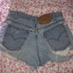 Vintage Levi distressed jean shorts size 25/26